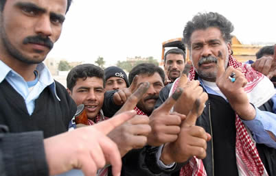 Iraqi_voters_inked_fingers2